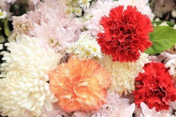 Wall Mural - Red carnation in pink and white flowers bouquet.