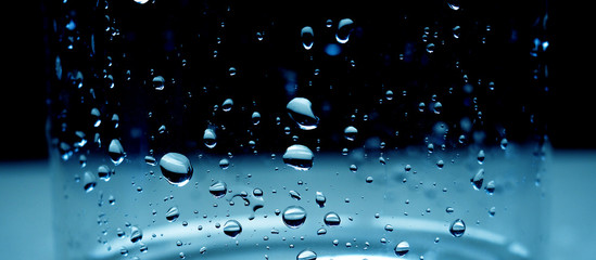 Sticker - Water drops over blue glass background, banner for website