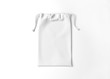 White drawstring bag on white background. Fabric cotton small bag. Isolated pouch.