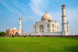 Fototapeta Młodzieżowe - Taj Mahal on a sunny day. An ivory-white marble mausoleum on the south bank of the Yamuna river in Agra, Uttar Pradesh, India. One of the seven wonders of the world.