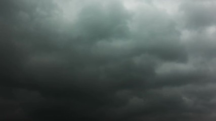 Wall Mural - dramatic sky, black heavy clouds - 4k timelapse