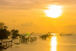 © Narong Niemhom - golden sky above fishing trap in Pak Pra Talay Noi sea Phatthalung south of Thailand