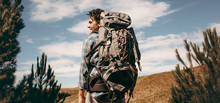 Man With Backpack Going On A Camping