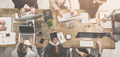 people working around a table