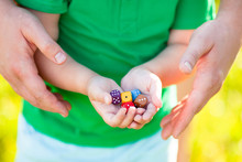 Kid And Adult Holding In Hands Mixed Color Dices