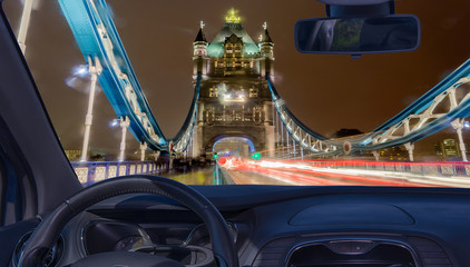 Wall Mural - Car windshield view of Tower Bridge at night, London, UK