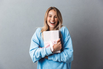 Poster - Portrait of a laughing young blonde girl