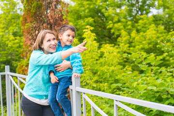 Poster - mom and son on a walk in the Park