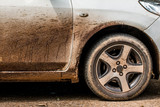 Asphalt on a white car difficult to clean dirty car,