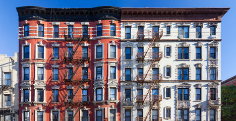 Fototapete - Panoramic view of old brick building against blue sky background in the East Village of Manhattan in New York City