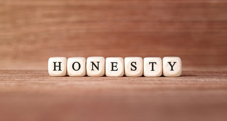 Word HONESTY made with wood building blocks