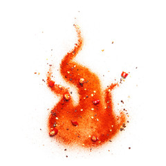 Wall Mural - Chili powder, sliced chili and chili flakes forming a fire