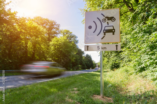 Fotografía Speed limit speed camera sign close to the road