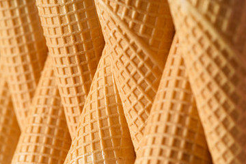 Wall Mural - Ice cream waffle cones row abstract background