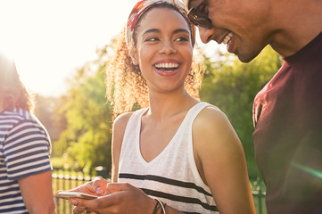 Young couple using mobile phone