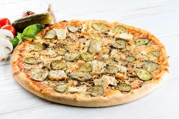 Canvas Print - Appetizing hot Italian pizza with cheese, mushrooms and cucumber