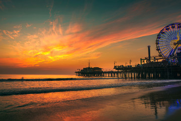 Visitors enjoy sunset above Santa Monica Pier in Los Angeles