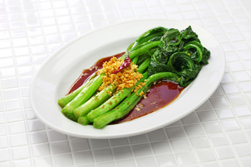 choy sum stir fry with oyster sauce and garlic, chinese cuisine