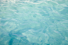 Blue Sea Ocean Water Background .Tropical Pattern Blue Ripple Curl Water In Swimming Pool .