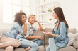 © Prostock-studio - Female friends chatting at home
