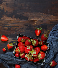 Wall Mural - Strawberries in a box on a  table