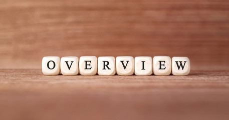 Poster - Word OVERVIEW made with wood building blocks