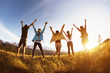 © cppzone - Group happy friends mountains sunset raised arms