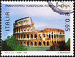 Ancient Colosseum of Rome on italian postage stamp