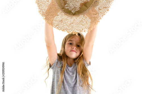 Fotografie, Obraz Happy little girl cheering and waving her hat