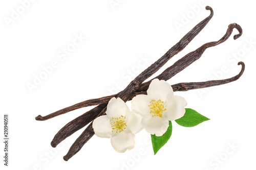 Cuadros en Lienzo Vanilla sticks with flower and leaf isolated on white background