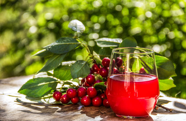 Fresh cherry juice and cherries.