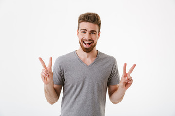 Wall Mural - Portrait of a cheerful young bearded man