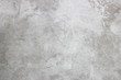 Abstract texture of decorative plaster. Grunge background of stucco texture. Gray painted surface.