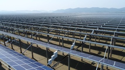 Poster - aerial video of solar power farms, huge clean energy generating station