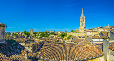 Wall Mural - Aerial view of French village Saint Emilion dominated by spire of the monolithic church