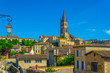 Aerial view of French village Saint Emilion dominated by spire of the monolithic church