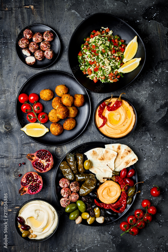 Arabic traditional cuisine. Middle Eastern meze platter with pita ...