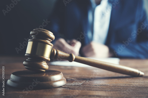 Fotomural Law and Justice concept.Man with hammer