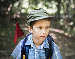 Wall Mural - Boy hiking through a forest