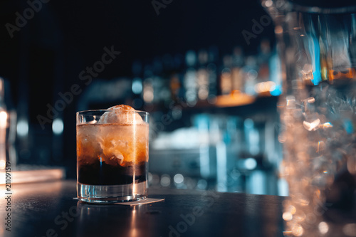 Cuadros en Lienzo white russian cocktail with icecream on backlighted background;