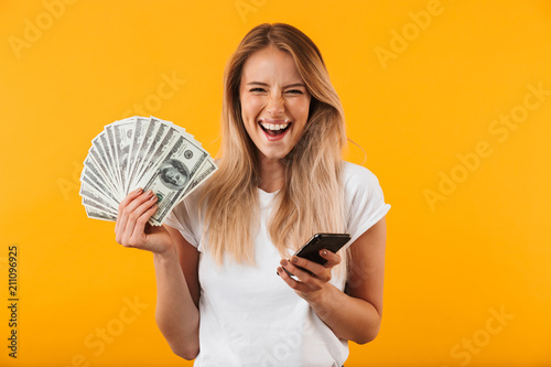 Cuadros en Lienzo Portrait of an excited young blonde girl