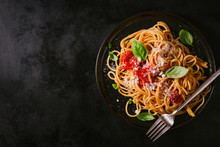 Dark Plate With Italian Spaghetti On Dark