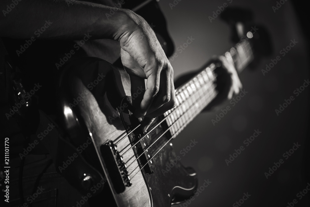 Electric bass guitar player hands, live music - obrazy, fototapety, plakaty 