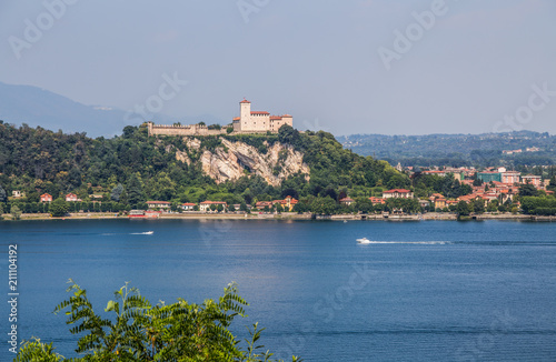 Fotografie, Obraz View of Rocca Borromea in Angera town, Angera, Maggiore Lake, Varese, Lombardy, Italy