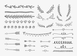 vector dividers, laurels, swirls and arrows. hand drawn doodle design elements. borders and lines is