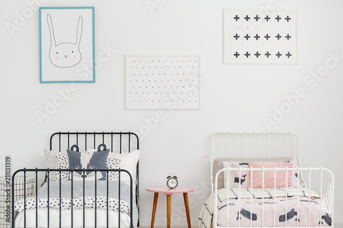 Close Up Of Two Metal Frame Beds With Bedding And Posters On A White Wall In A Room Of A Private Medical Clinic For Children Simple Clean Interior Real Photo Buy This Find inspiration for how to decorate the bedroom with posters from desenio. adobe stock
