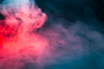 Colorful smoke on a black background closeup