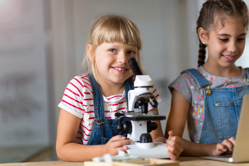 Wall Mural - Girls with microscope
