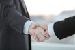 © yurolaitsalbert - close up.handshake of business people in blurred background