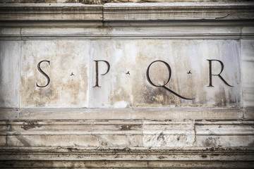 Wall Mural - SPQR engraved on stone in Rome, Italy